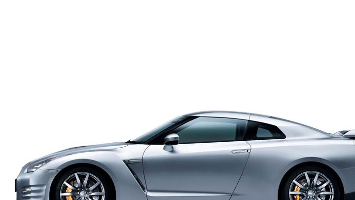 Side Pose Of 2012 Nissan GT-R In Silver N White Background
